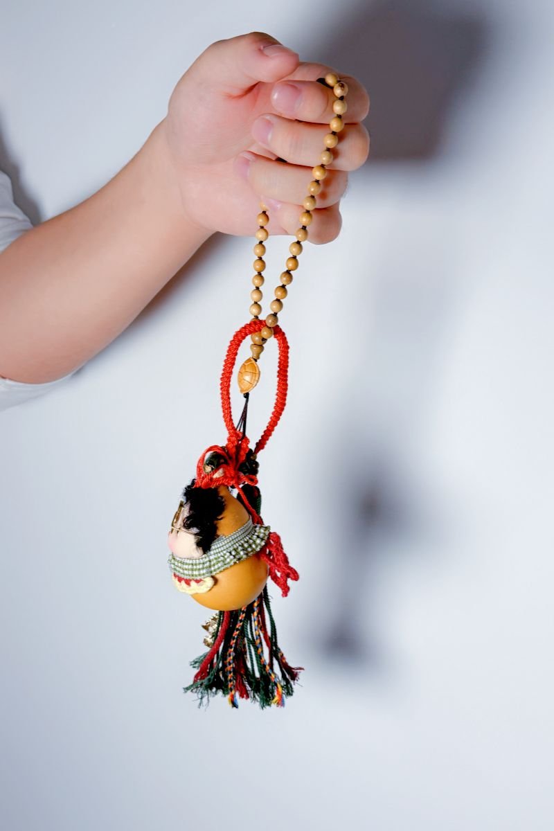 Cute doll tassel gourd pendant