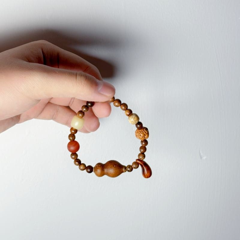 Water drop shaped cow bone sandalwood bead gourd bracelet