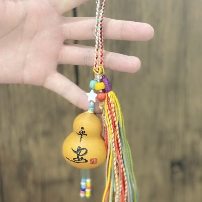 Carved peace gourd pendant