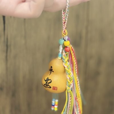 Carved peace gourd pendant