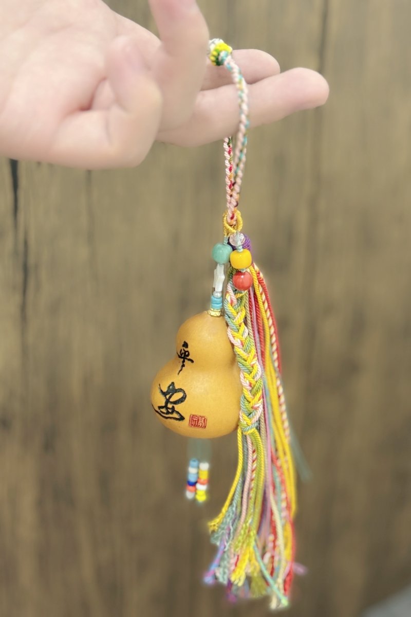 Carved peace gourd pendant