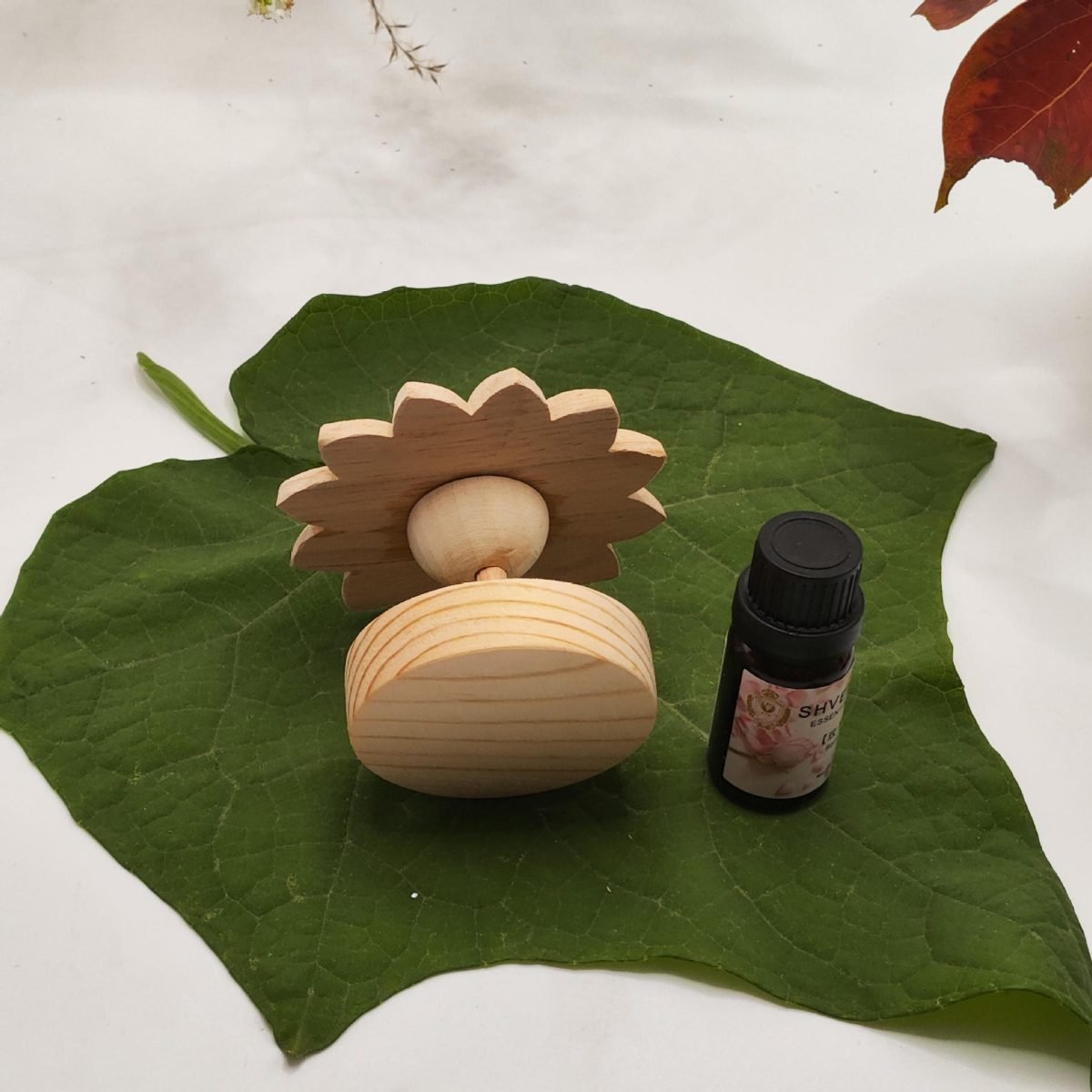 A flower aromatherapy essential oil diffuser wood