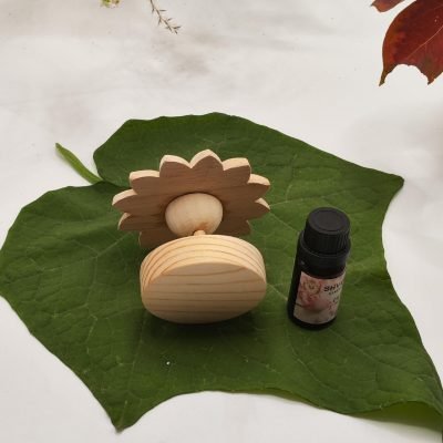 A flower aromatherapy essential oil diffuser wood